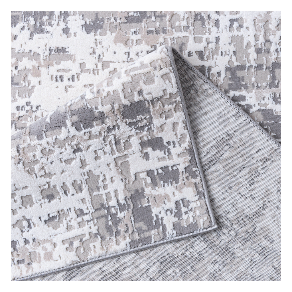 Folded Clouds Area Rug and its backing  